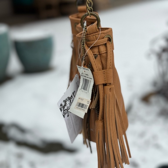 AUTOGRAPHED Carlos Santana drawstring Crossbody bag and collectible keychain - Picture 4 of 12